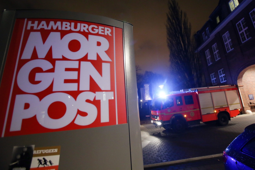 FOTO: Svētdienas rītā aizdedzināta Charlie Hebdo karikatūras pārpublicējušā Vācijas laikraksta redakcija